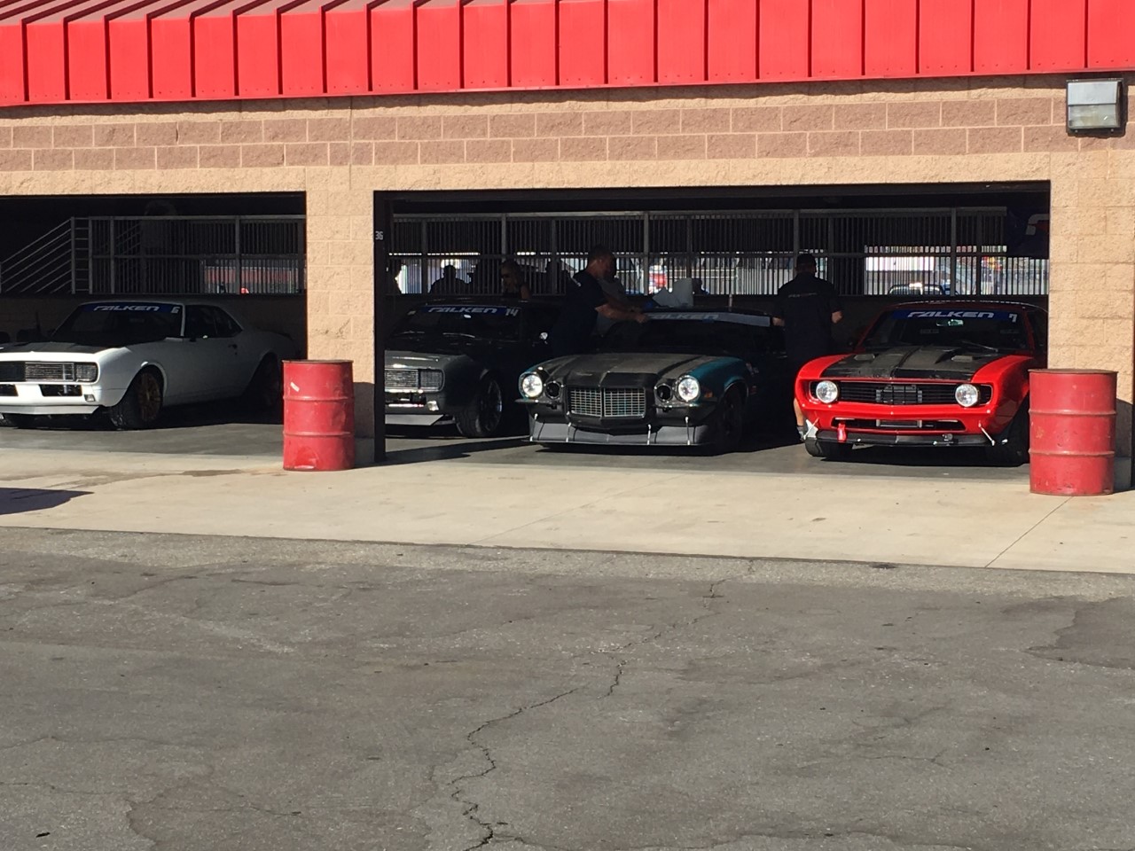 Camaro's in NASCAR Garage at racetrack